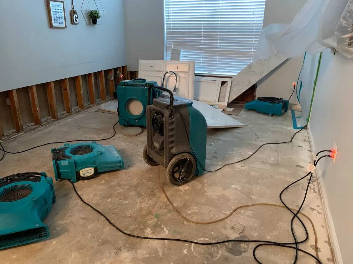 Dehumidifier in flood-cut room for Water Damage Restoration in Harwood Heights